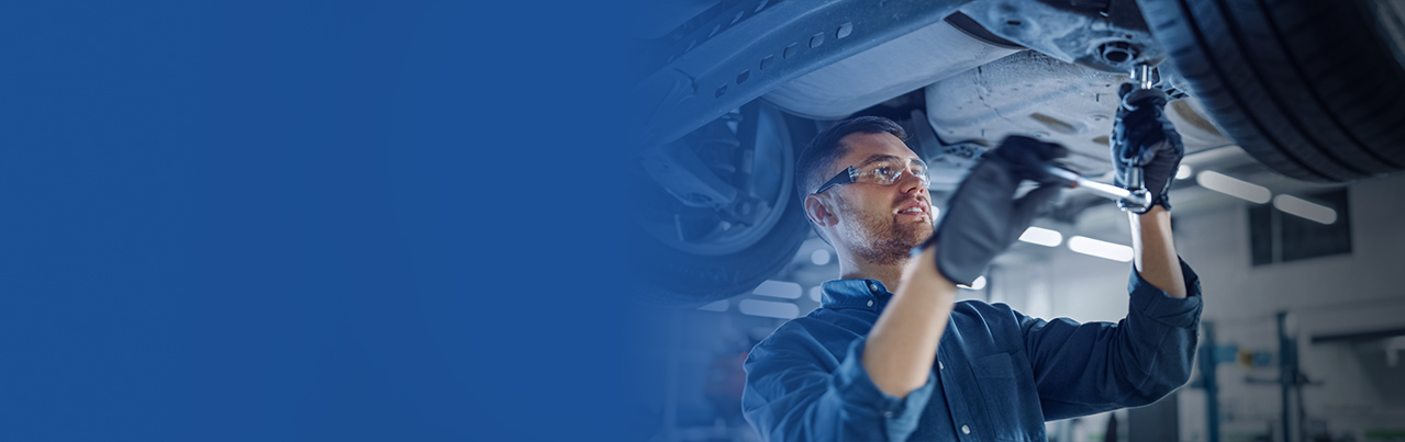 IN'n'OUT Autocentres mechanic at work